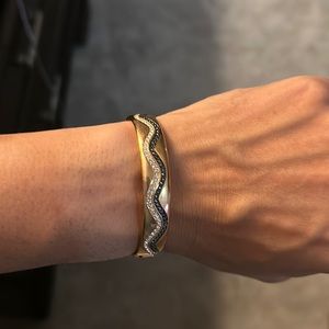 Authentic Swarovski Rose gold bangle. Black and clear crystals.